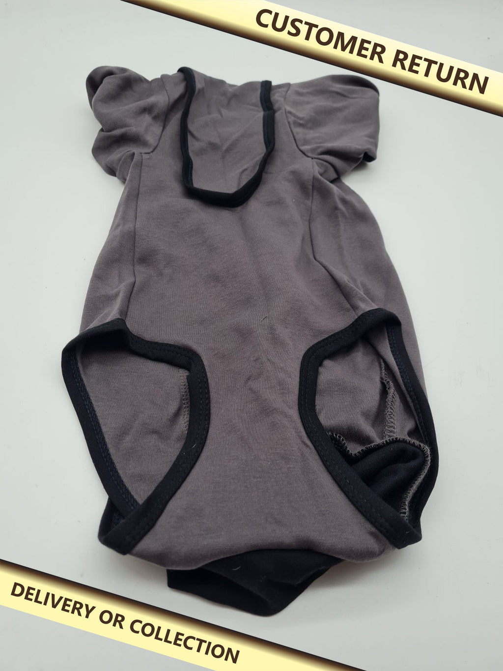 Dog bodysuit with zip fastening — photograph 1 — Customer return; auction delivery information shown on image