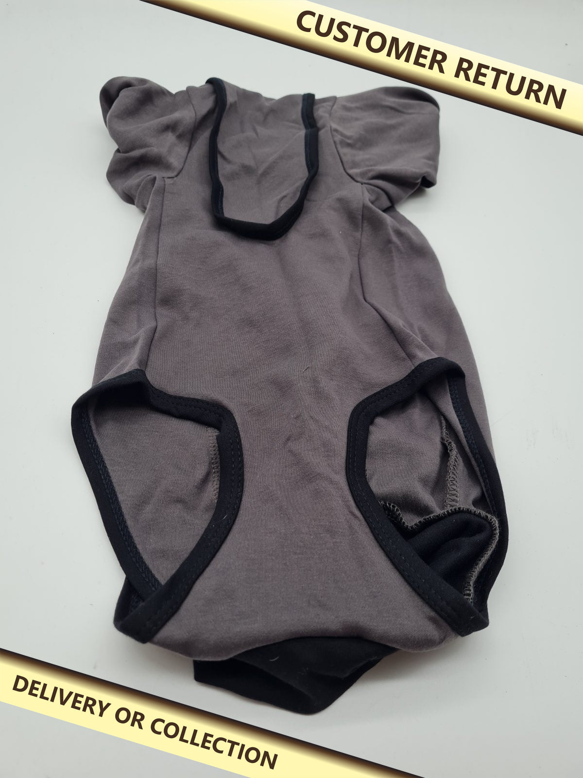 Dog bodysuit with zip fastening — photograph 1 — Customer return; auction delivery information shown on image
