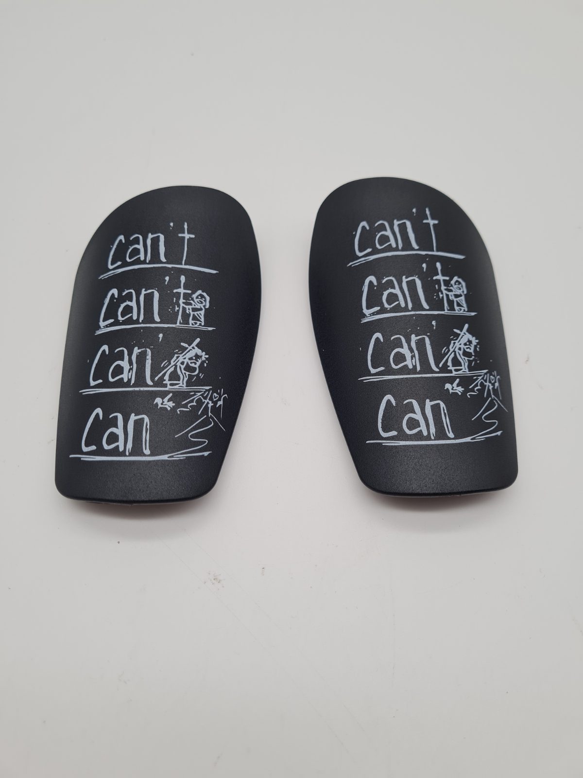 Pair of Motorcycle Knee Sliders — photograph 1