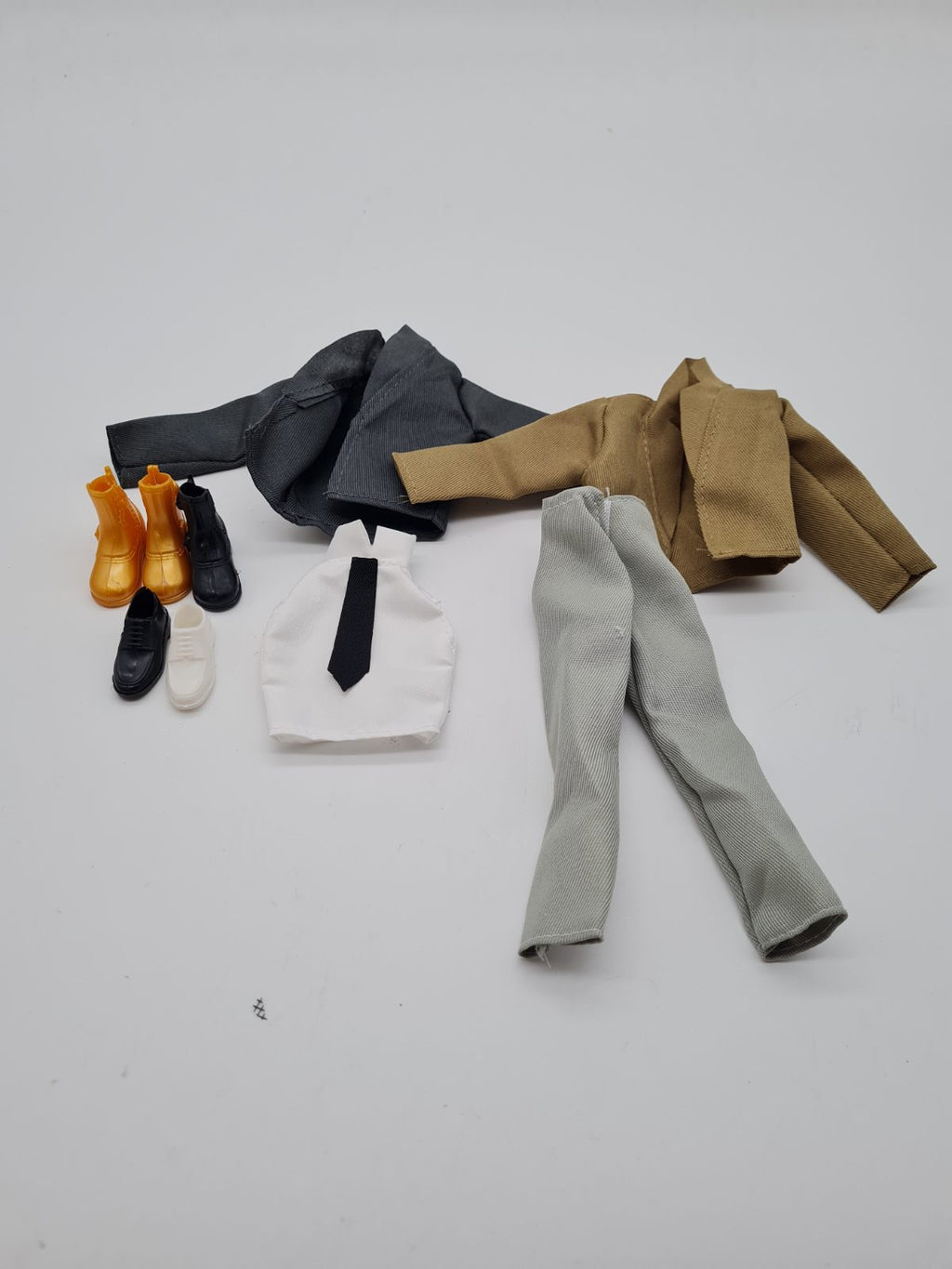 Doll Clothing and Footwear Assortment — photograph 1
