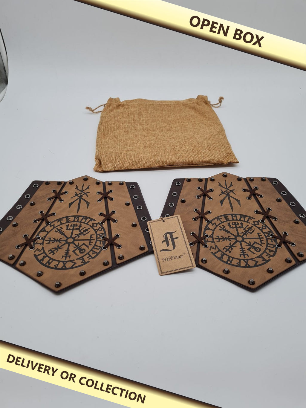 Medieval-Style Arm Bracers — photograph 1 — Open box; auction delivery information shown on image