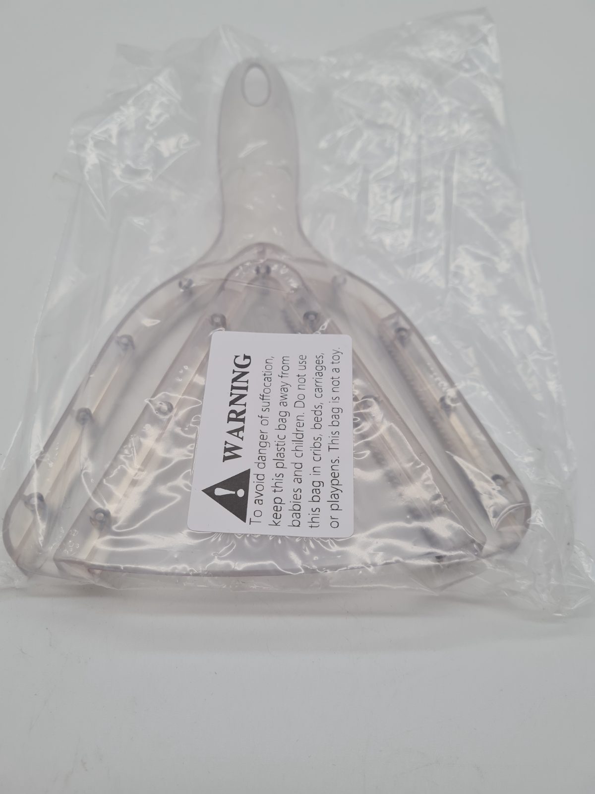 Handheld jar opener — photograph 2