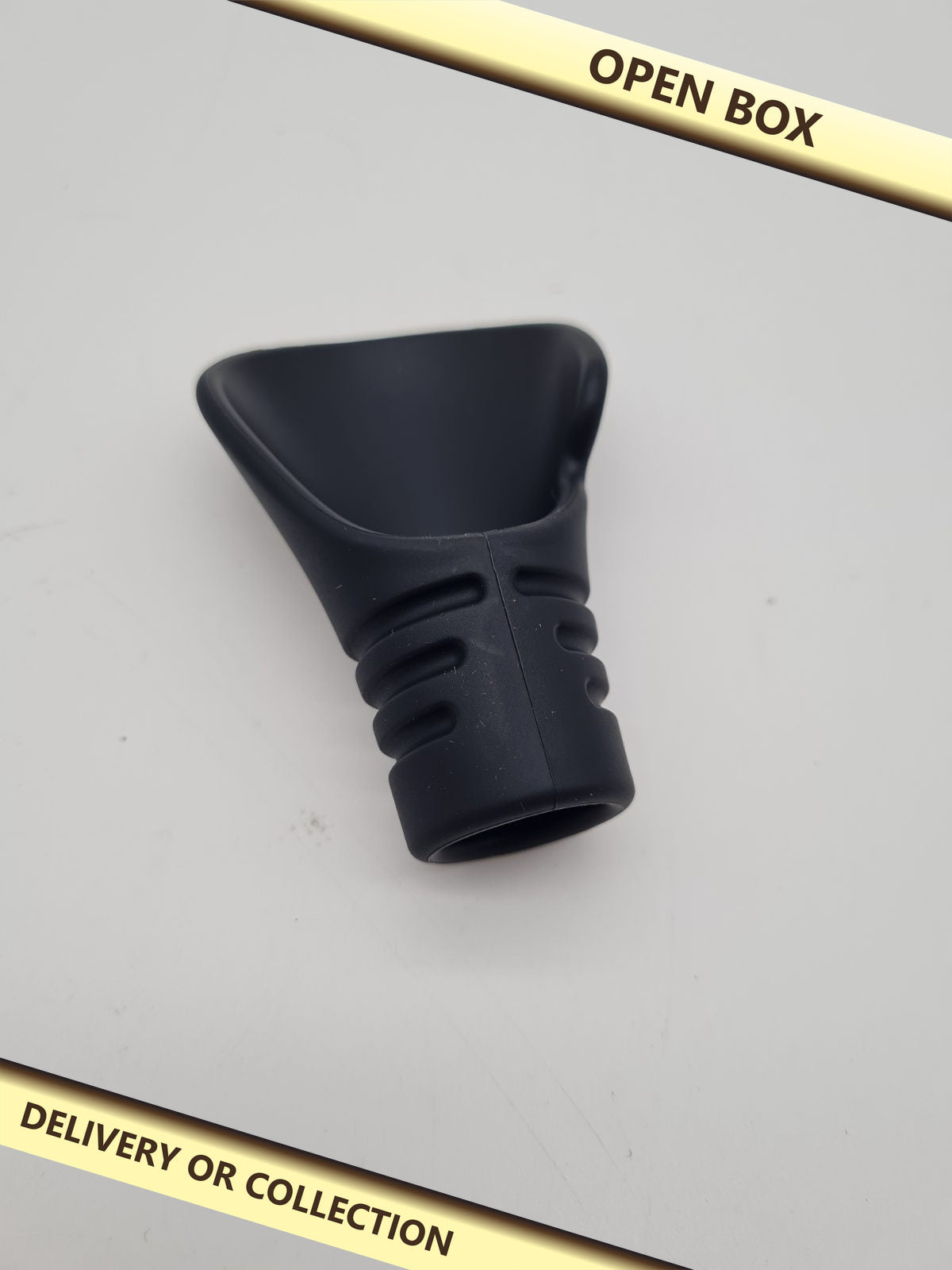 Thumb guard for baseball — photograph 1 — Open box; auction delivery information shown on image