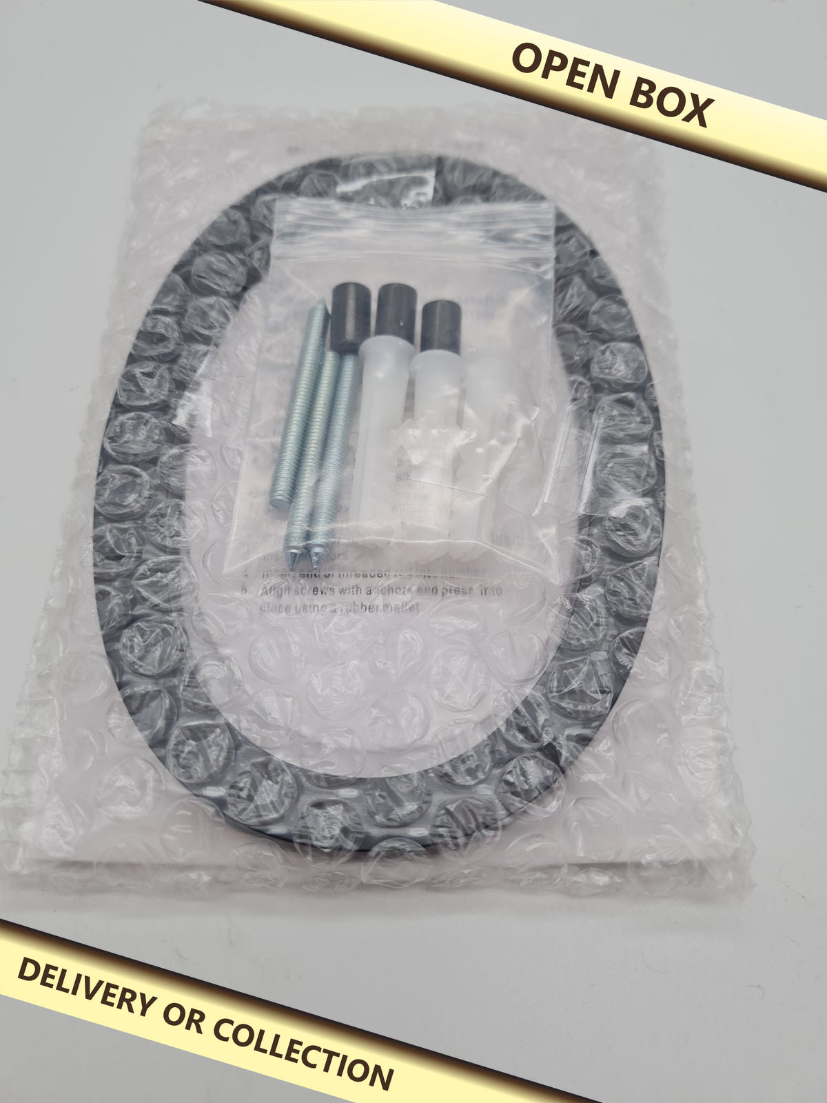 Floating wall-mount house number 0 — photograph 1 — Open box; auction delivery information shown on image