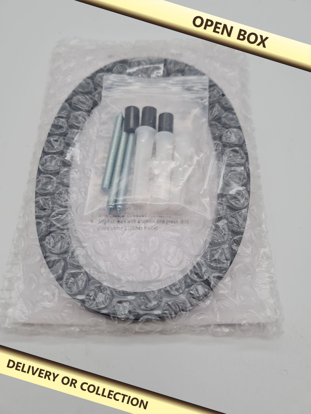 Floating wall-mount house number 0 — photograph 1 — Open box; auction delivery information shown on image