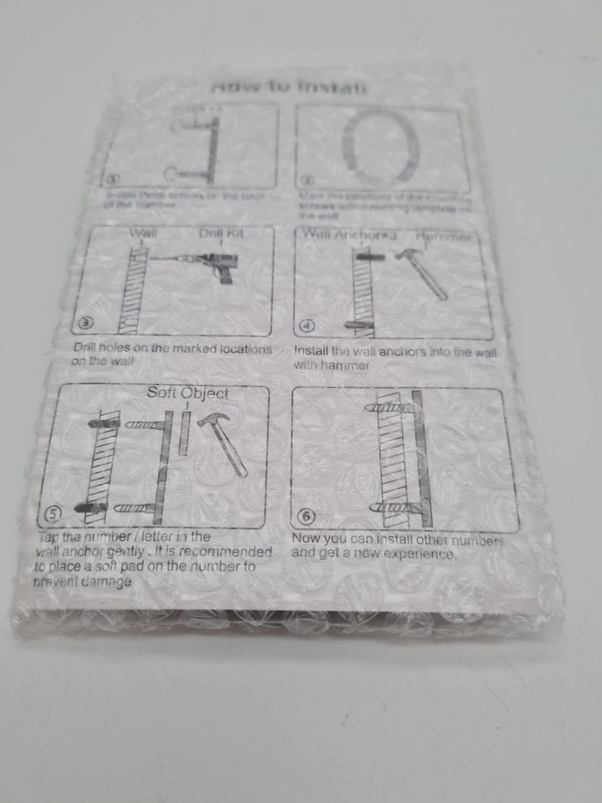 Floating wall-mount house number 0 — photograph 2