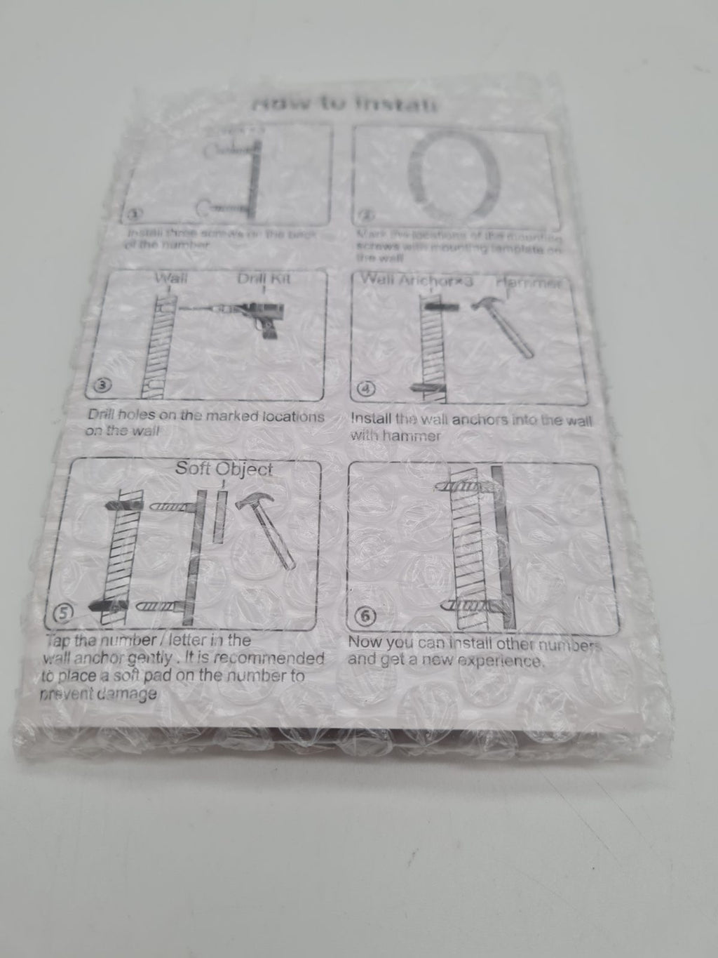 Floating wall-mount house number 0 — photograph 2