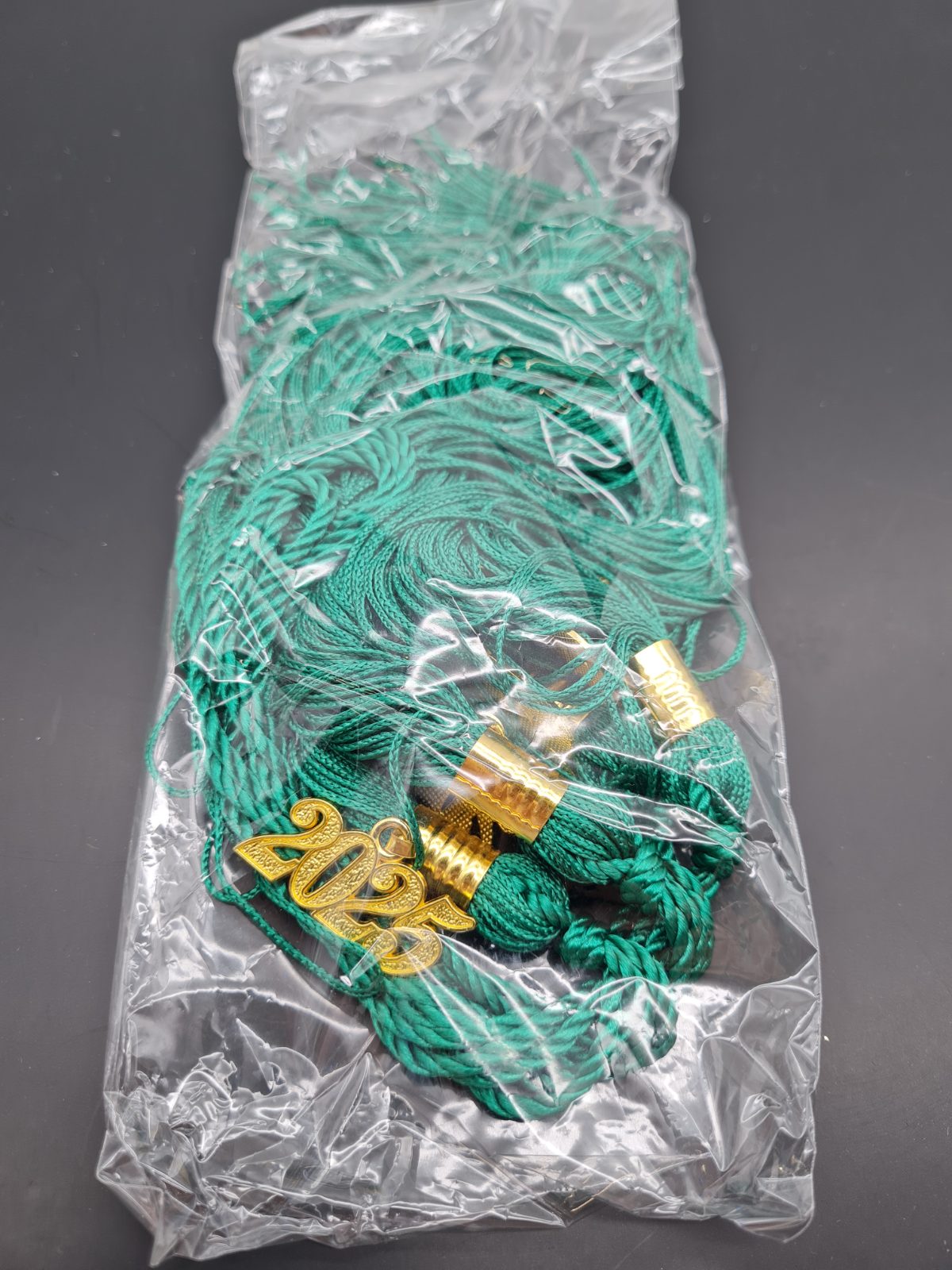 Graduation cap tassel set with 2025 charms — photograph 1