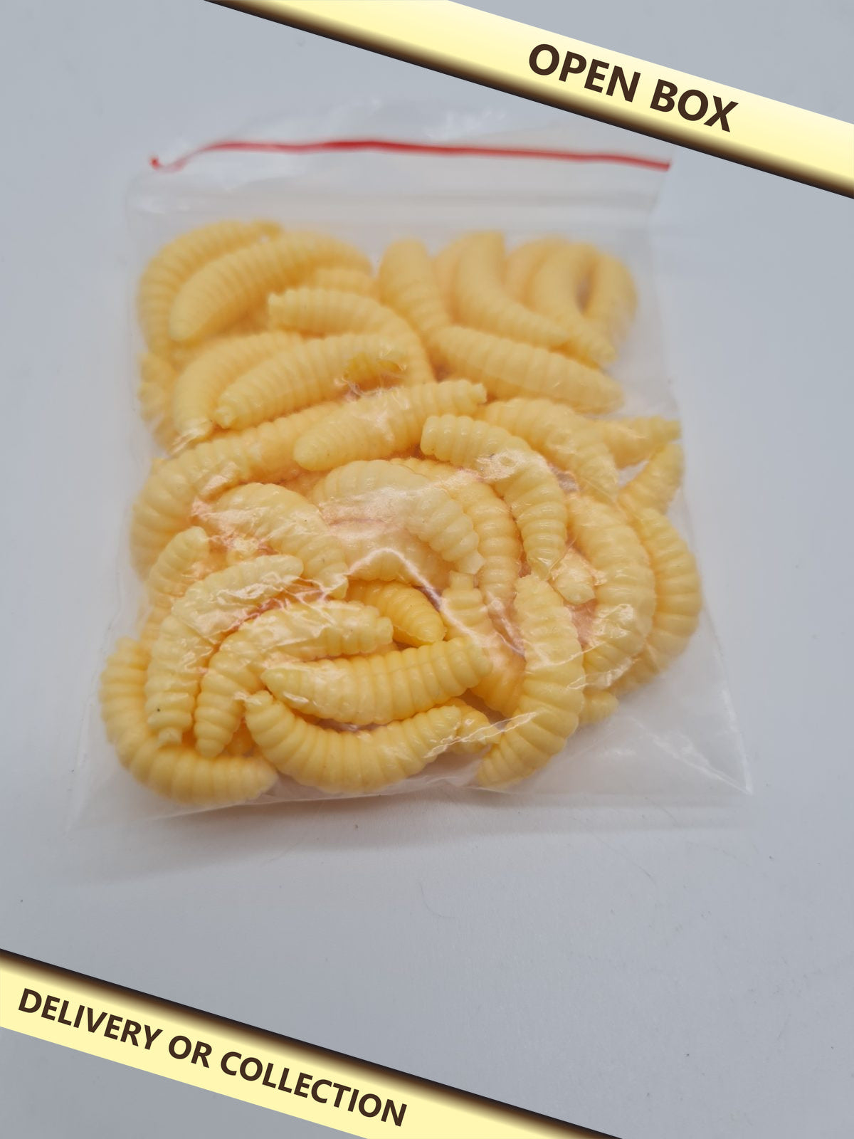 Artificial Maggot Fishing Baits — photograph 1 — Open box; auction delivery information shown on image