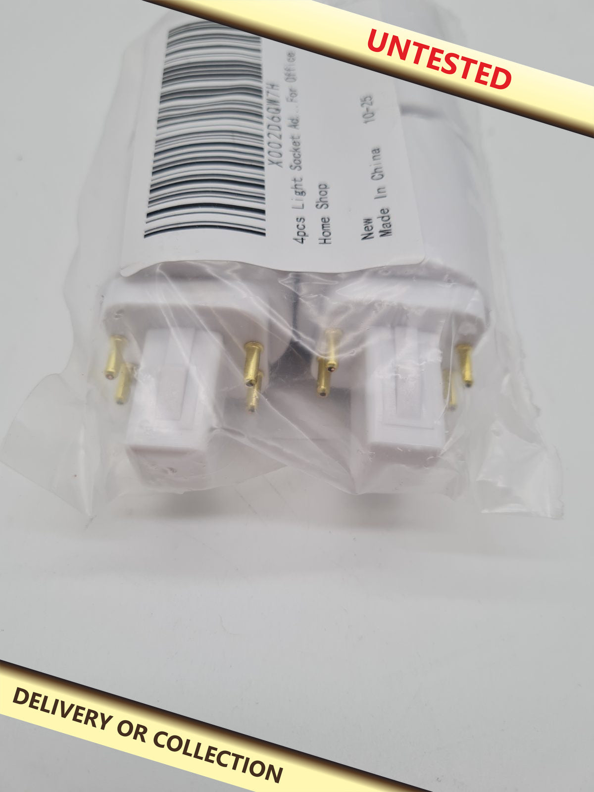 4-Piece Plug-In Light Socket Adapter Set — photograph 1 — Untested; auction delivery information shown on image