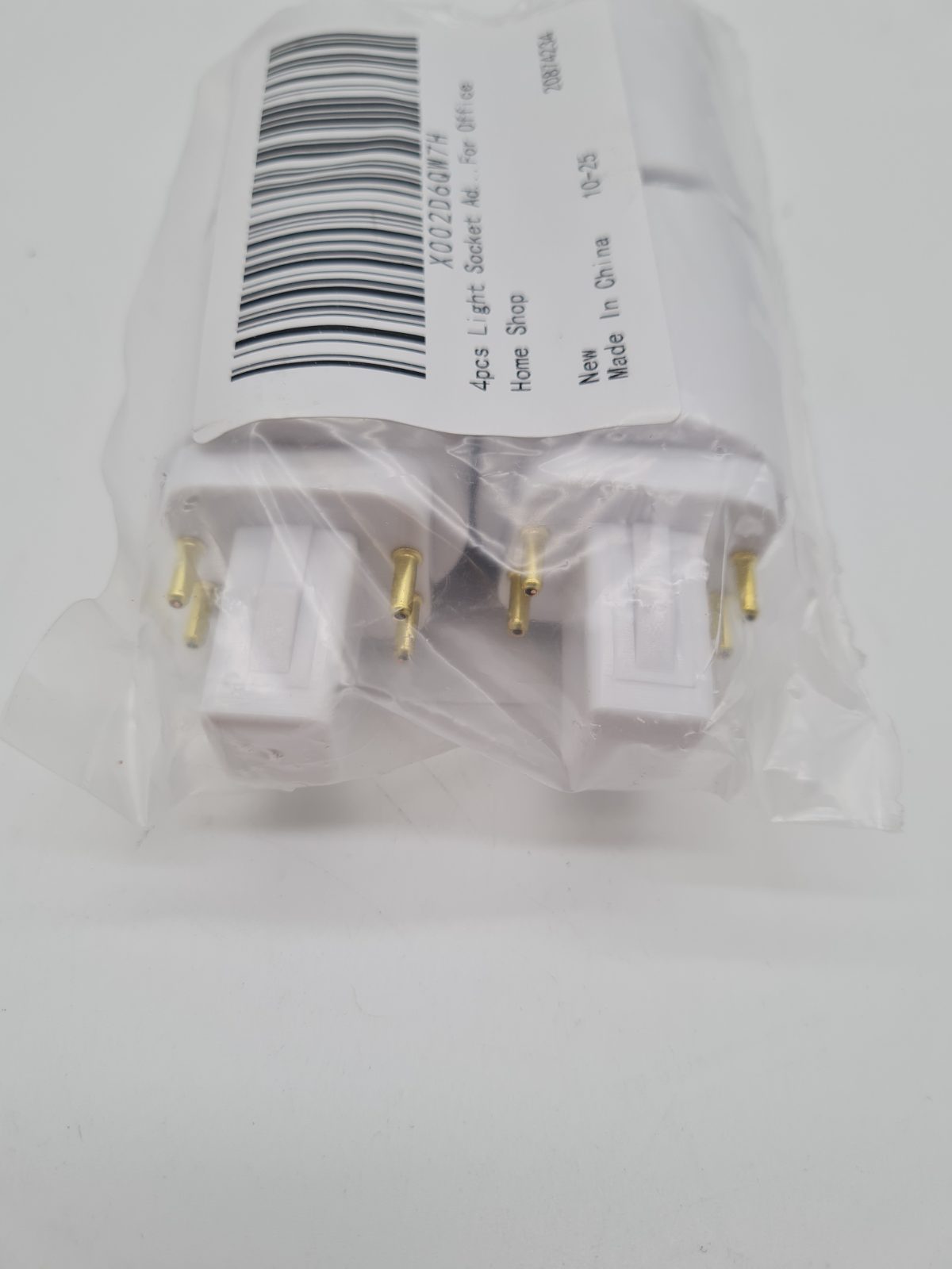 4-Piece Plug-In Light Socket Adapter Set — photograph 1