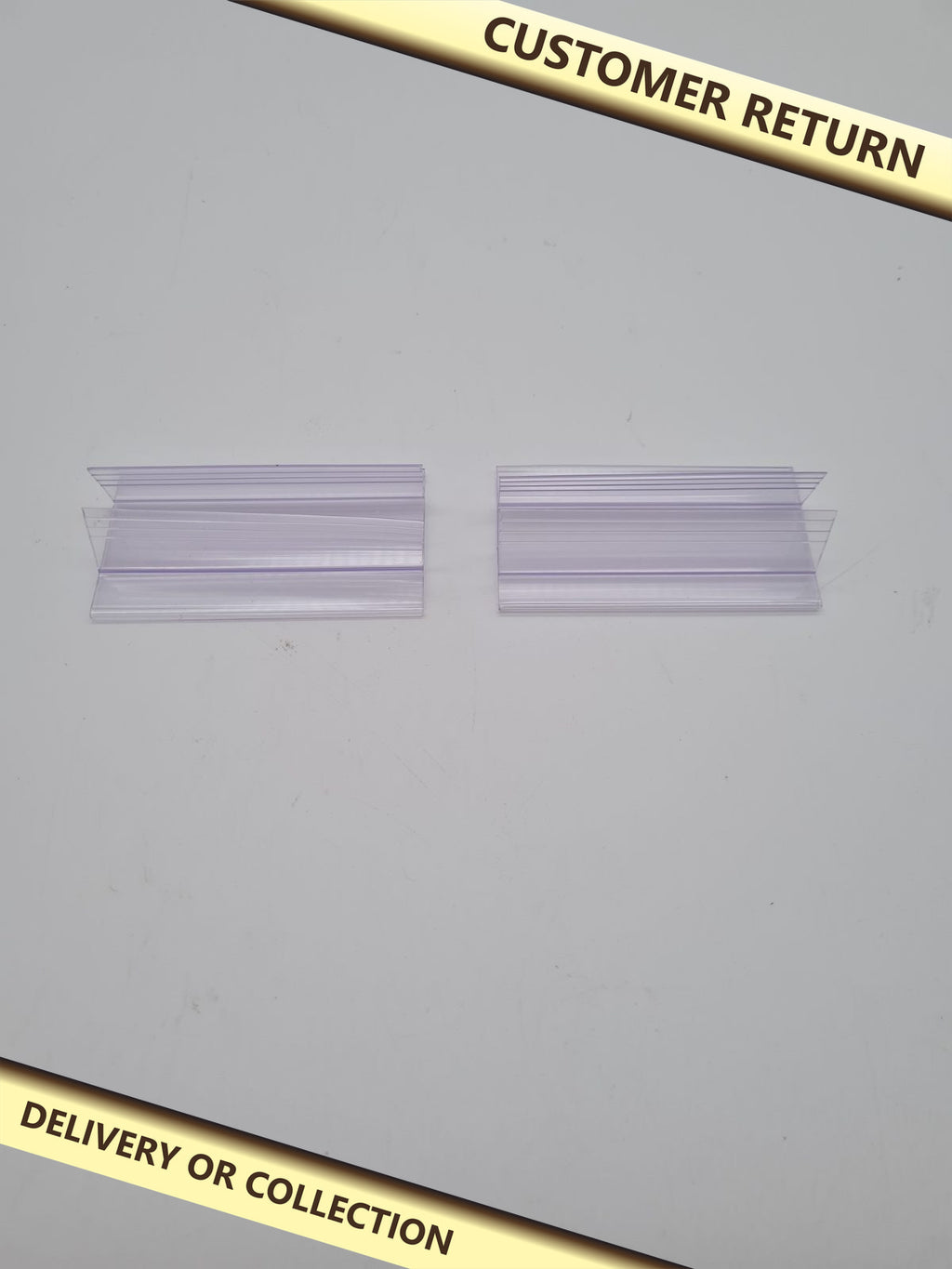 Bundle of plastic channel profiles — photograph 1 — Customer return; auction delivery information shown on image