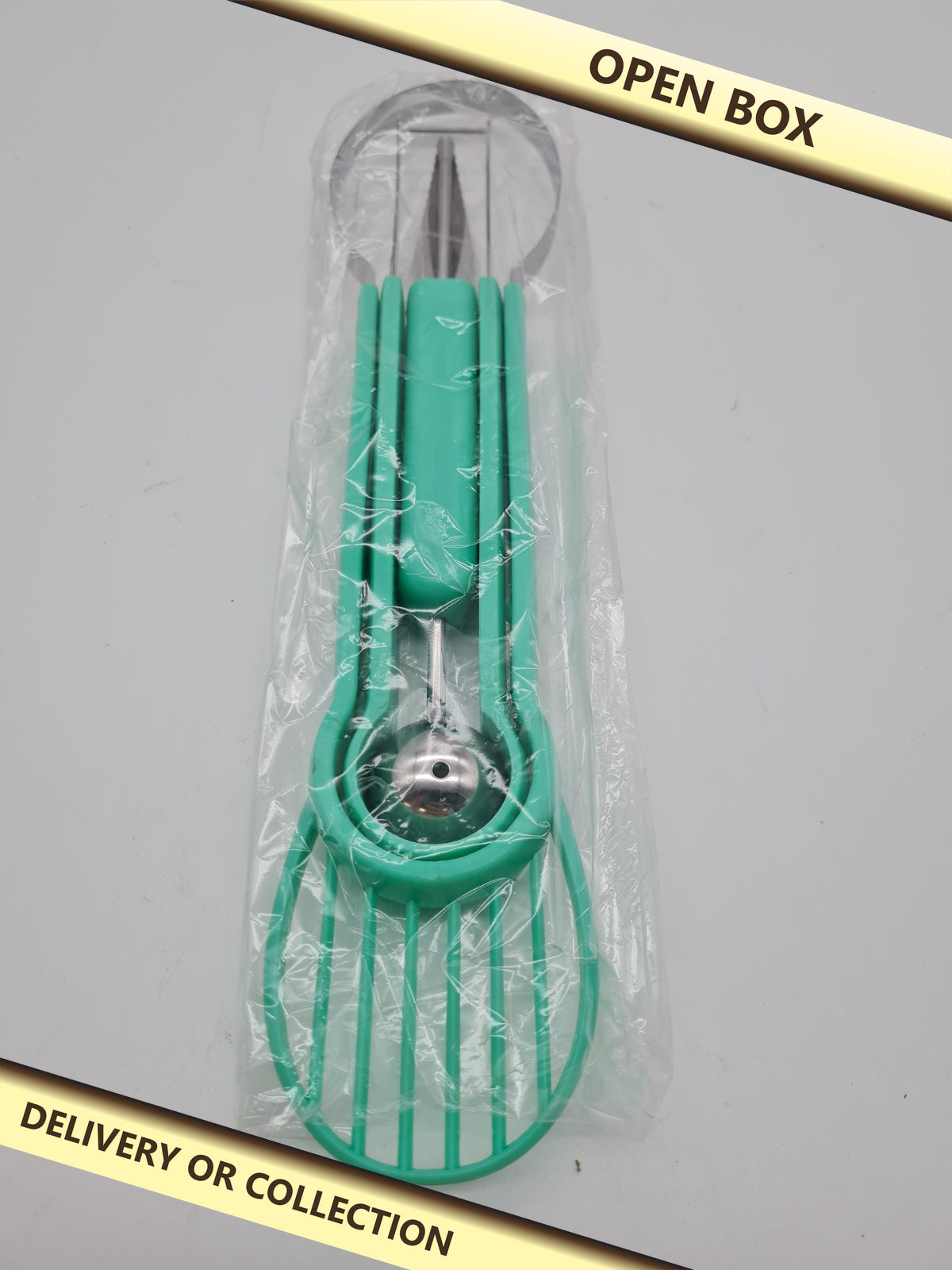 Watermelon Cutter and Slicer — photograph 1 — Open box; auction delivery information shown on image