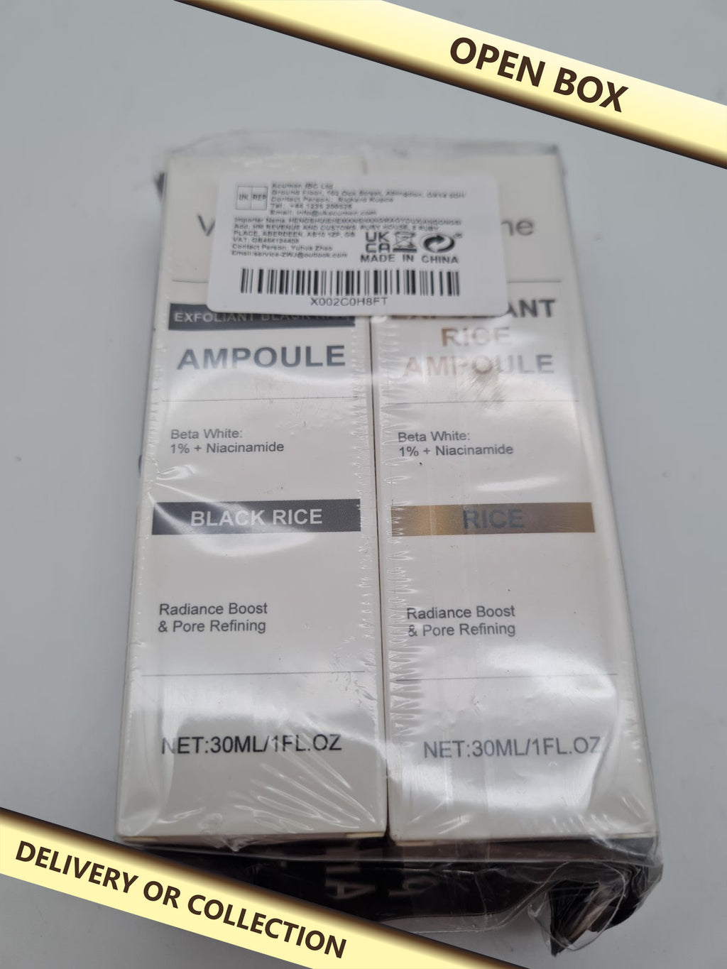 Black Rice Ampoule and Rice Ampoule. — photograph 1 — Open box; auction delivery information shown on image