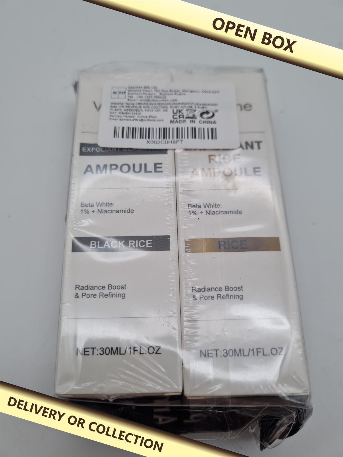 Black Rice Ampoule and Rice Ampoule. — photograph 1 — Open box; auction delivery information shown on image