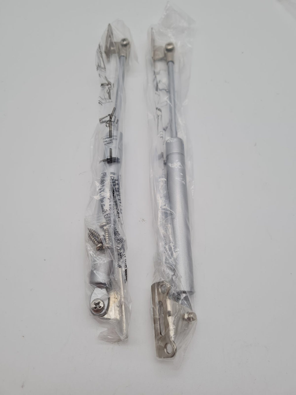 Pair of 120N Cabinet Door Gas Struts — photograph 1