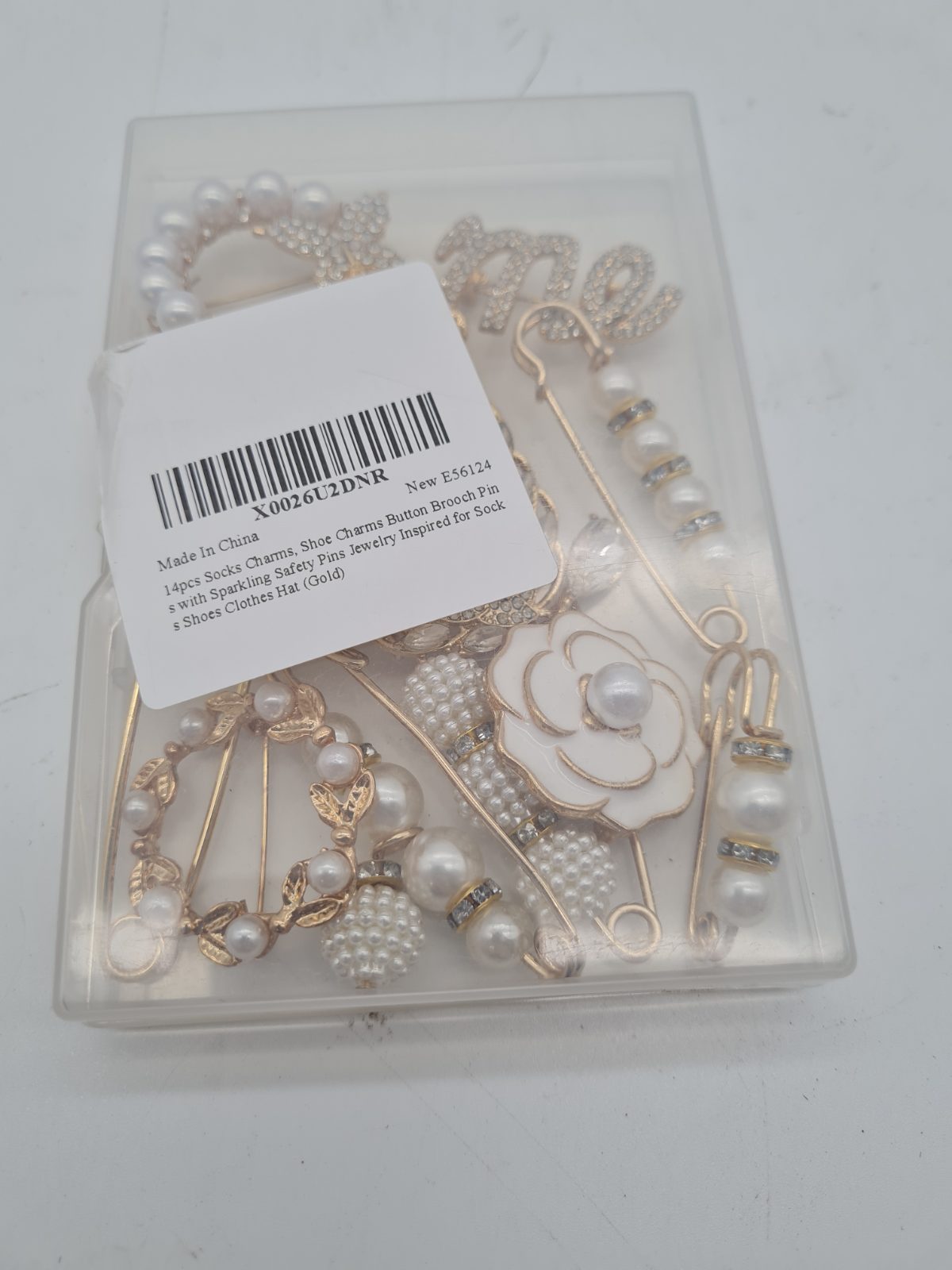 14-Piece Assorted Decorative Brooch and Safety Pin Set — photograph 1
