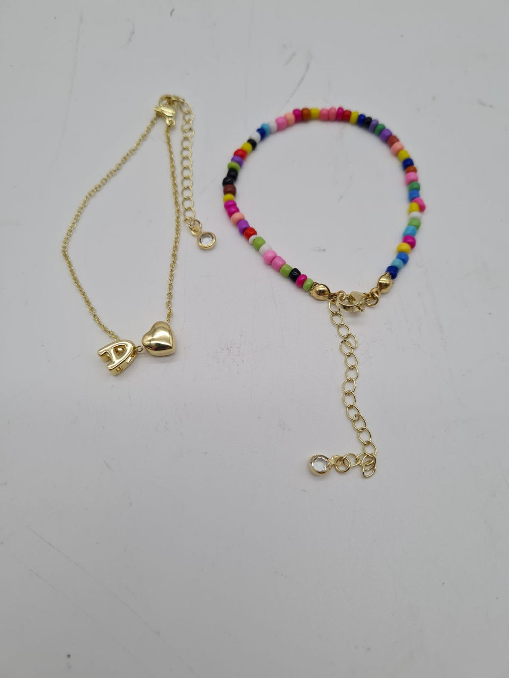 2 Colourful bracelet with initial A — photograph 1
