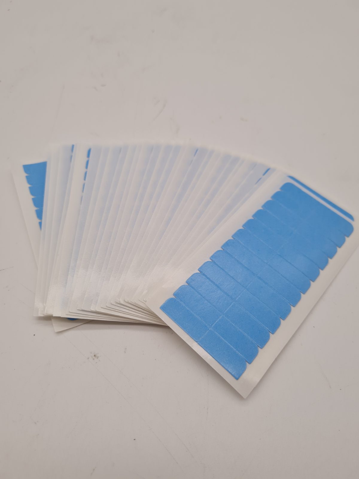 Pre-Cut Double-Sided Hair Extension Adhesive Tape Strips — photograph 1