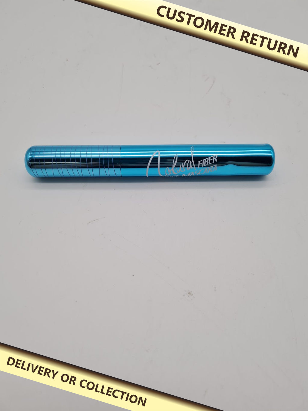 Natural Fiber Mascara — photograph 1 — Customer return; auction delivery information shown on image