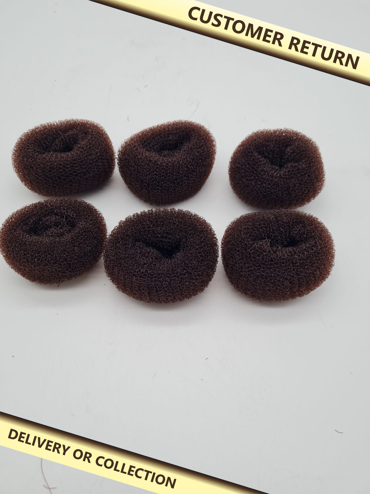 Set of 6 Small Hair Bun Makers — photograph 1 — Customer return; auction delivery information shown on image