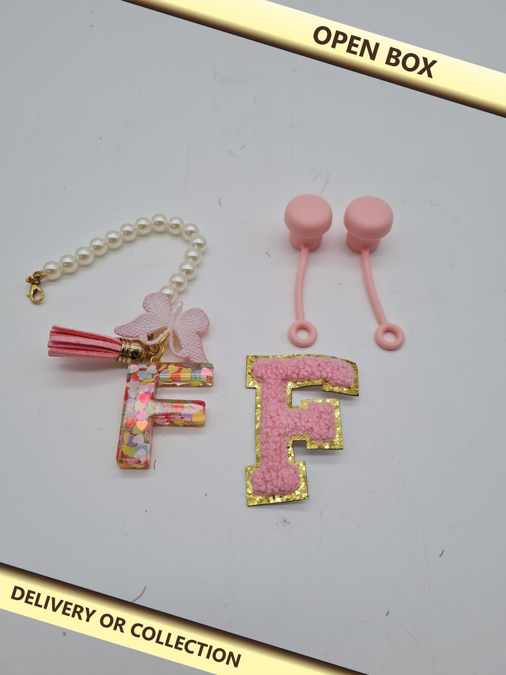 Letter F Clog Accessory Set 632125650046 — photograph 1 — Open box; auction delivery information shown on image