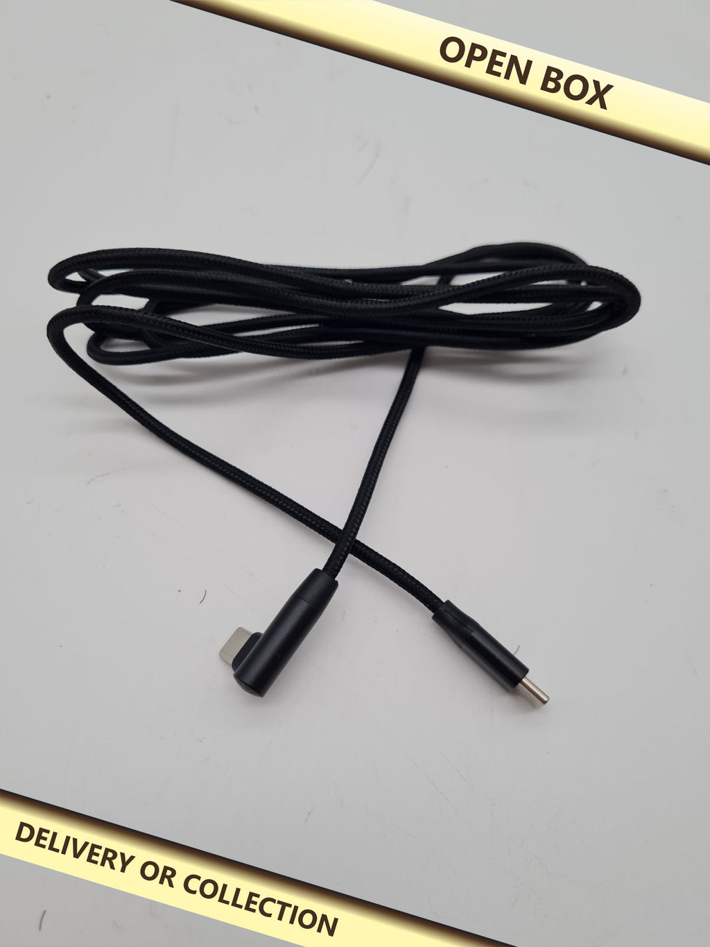USB-C to Right-Angled Lightning Cable for mac book pro — photograph 1 — Open box; auction delivery information shown on image
