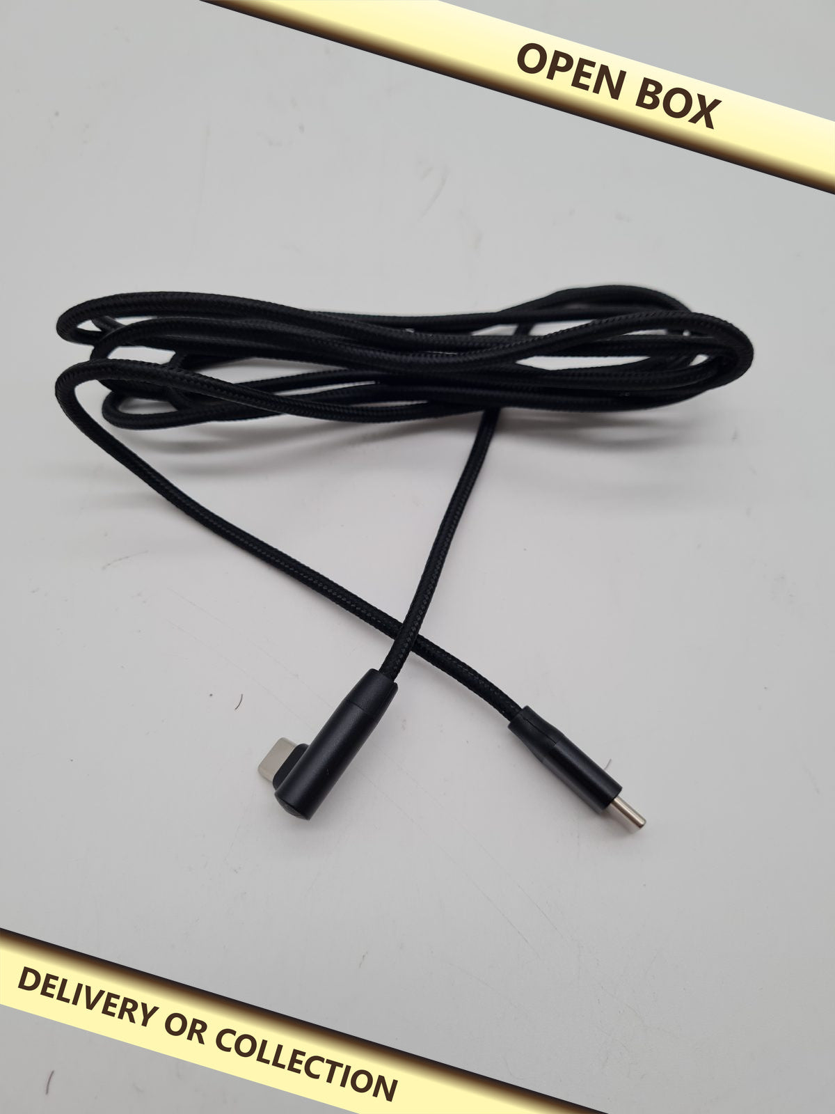 USB-C to Right-Angled Lightning Cable for mac book pro — photograph 1 — Open box; auction delivery information shown on image