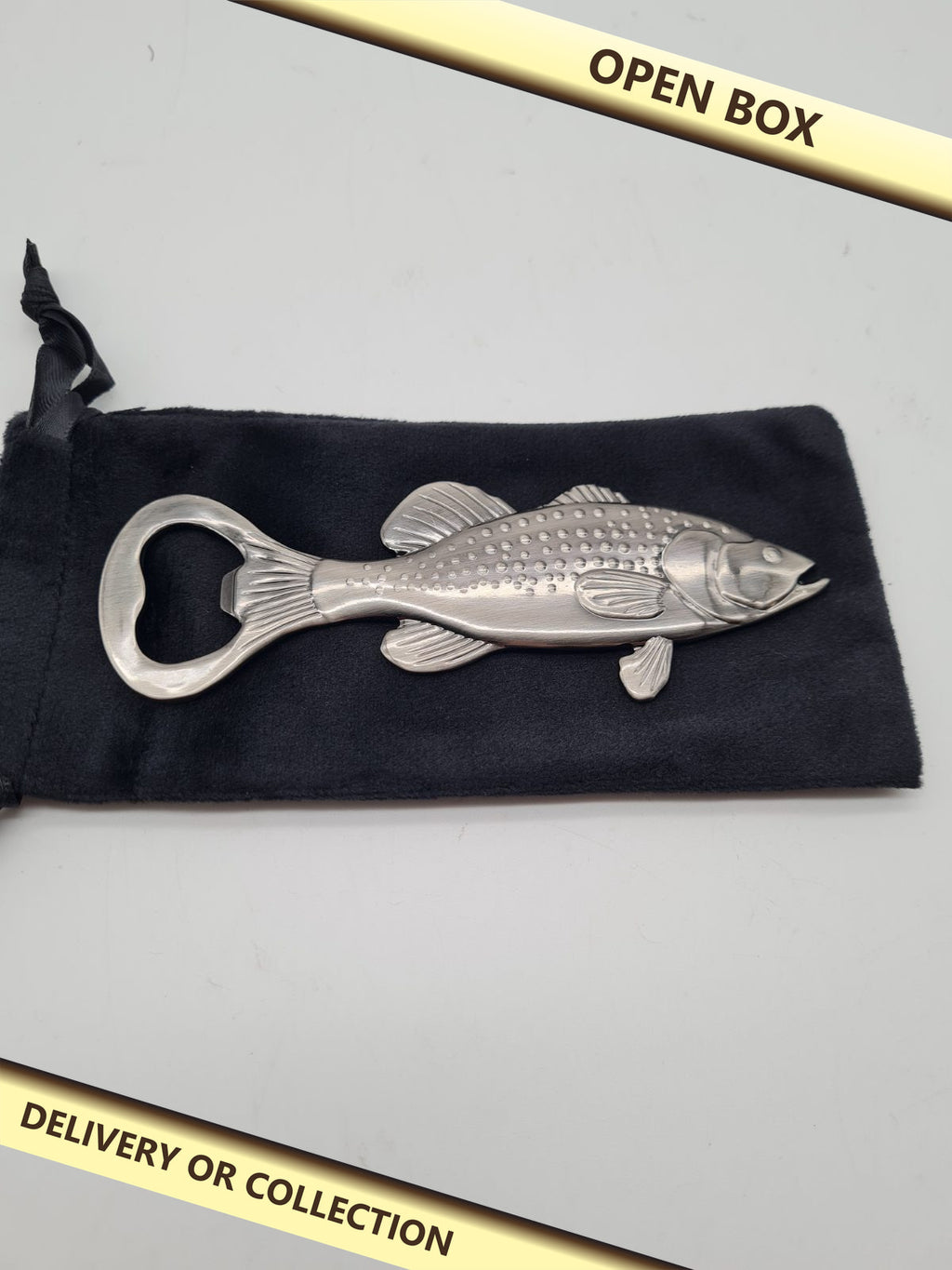 Fish-Shaped Bottle Opener — photograph 1 — Open box; auction delivery information shown on image