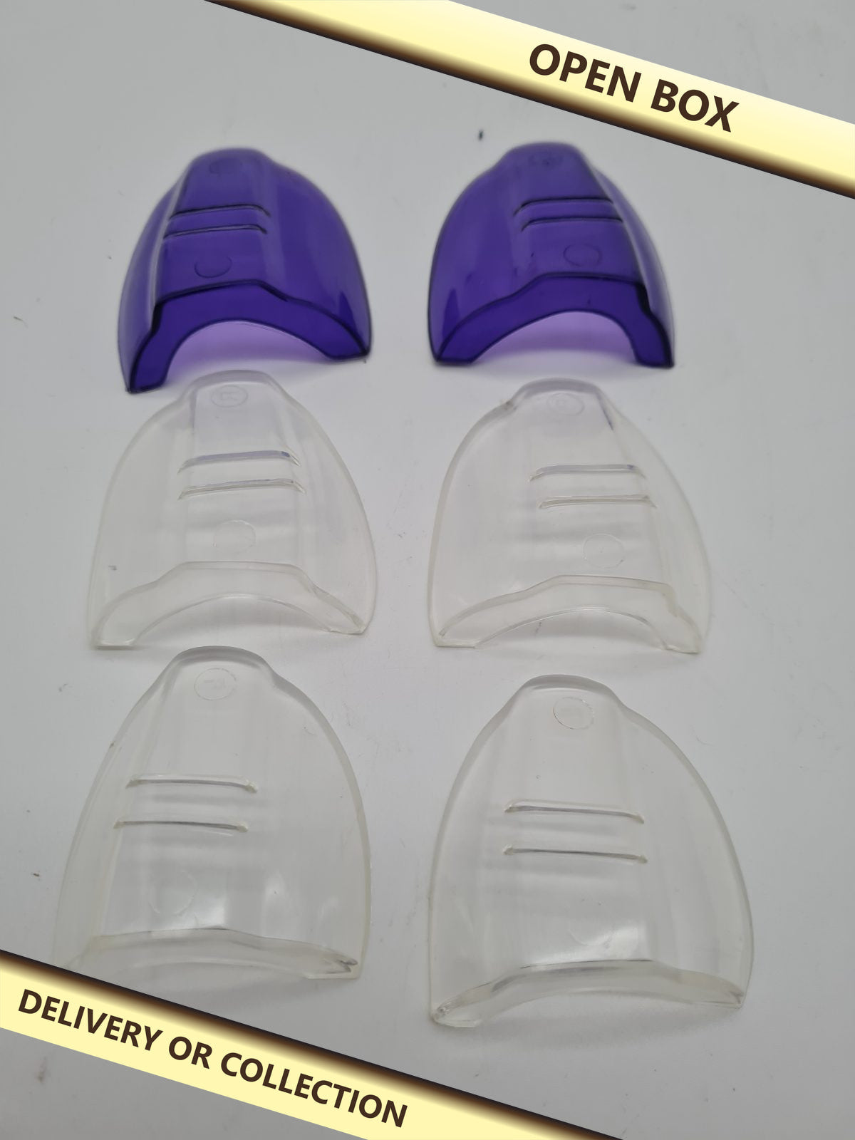 Silicone Heel Protectors - 3 Pairs — photograph 1 — Open box; auction delivery information shown on image