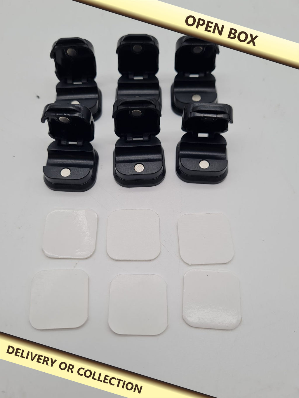 Set of 6 Magnetic Cable Clips — photograph 1 — Open box; auction delivery information shown on image