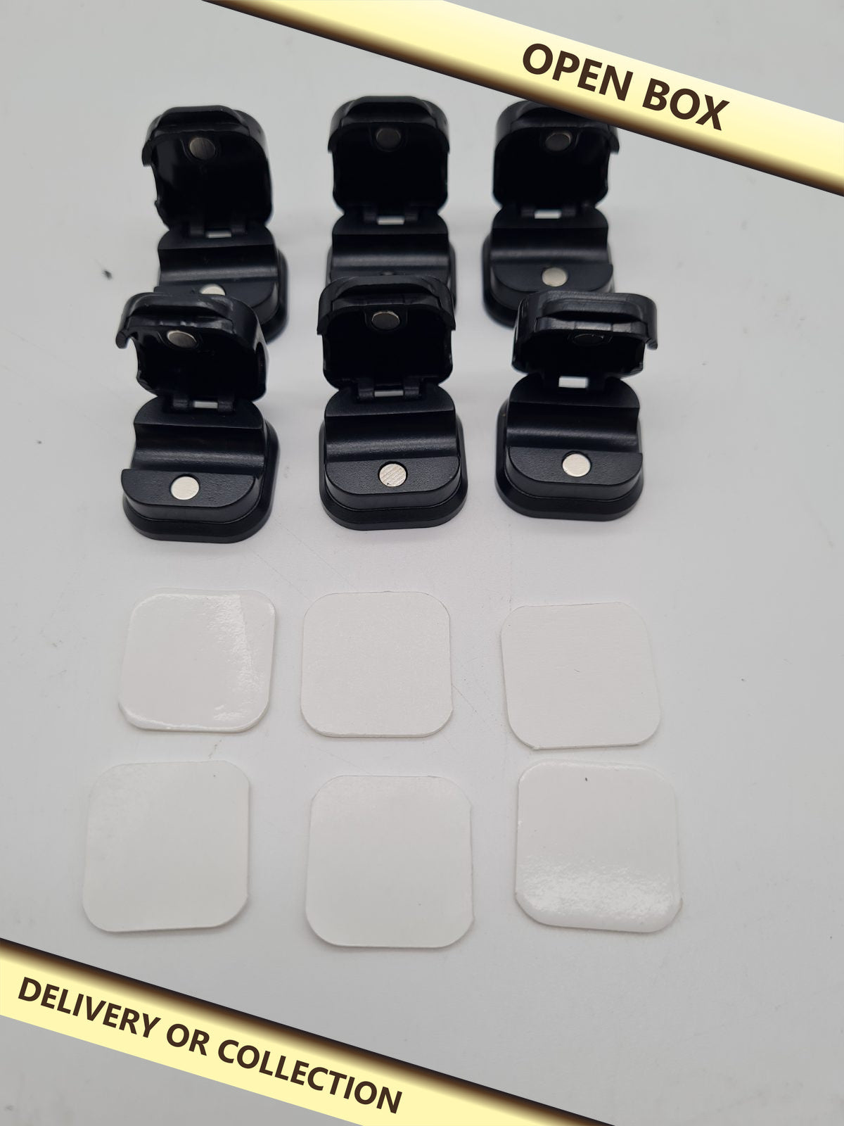 Set of 6 Magnetic Cable Clips — photograph 1 — Open box; auction delivery information shown on image