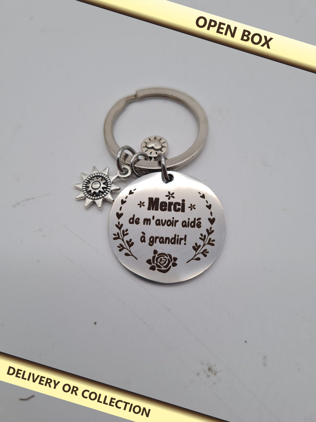 French Thank You Teacher Keyring — photograph 1 — Open box; auction delivery information shown on image