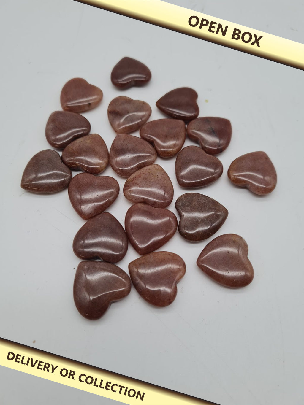 Set of 20 brown Heart-Shaped Polished Stones — photograph 1 — Open box; auction delivery information shown on image