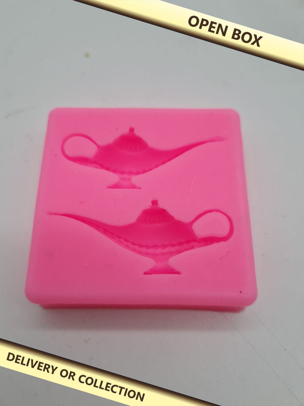 Genie Lamp Silicone Craft Mould — photograph 1 — Open box; auction delivery information shown on image