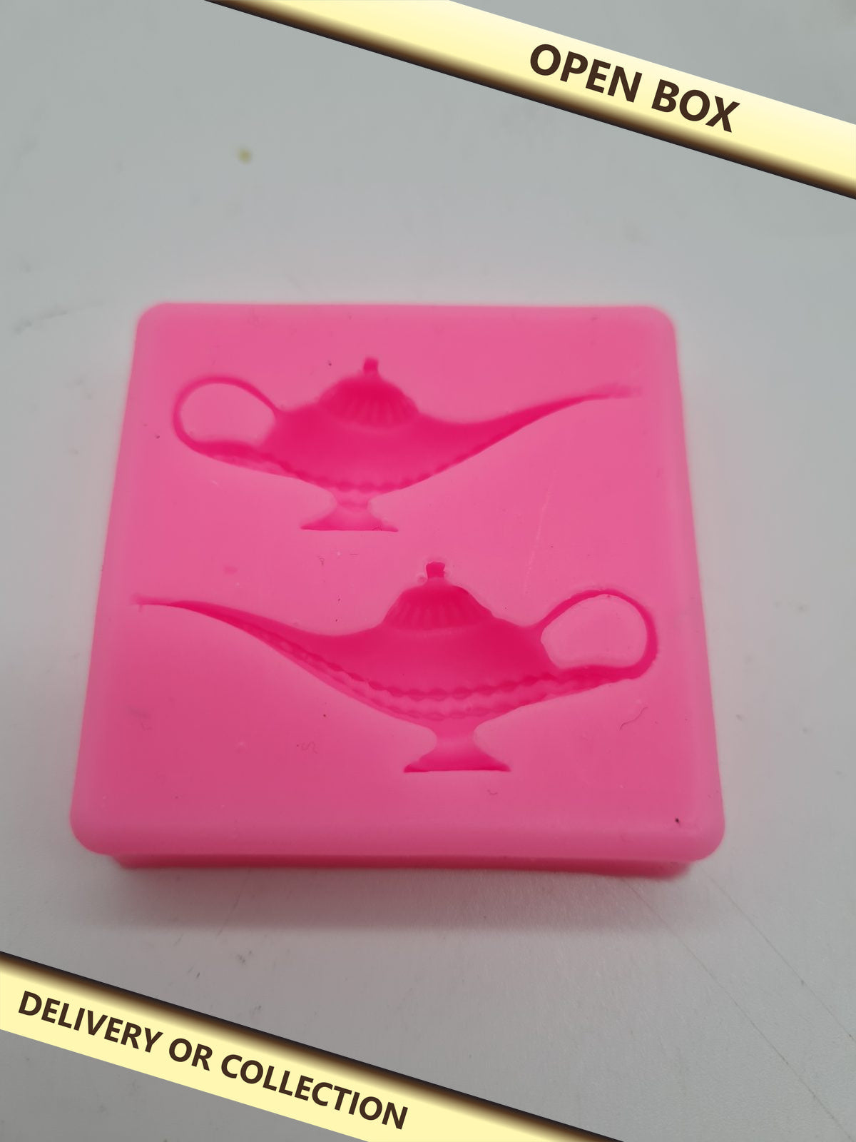 Genie Lamp Silicone Craft Mould — photograph 1 — Open box; auction delivery information shown on image