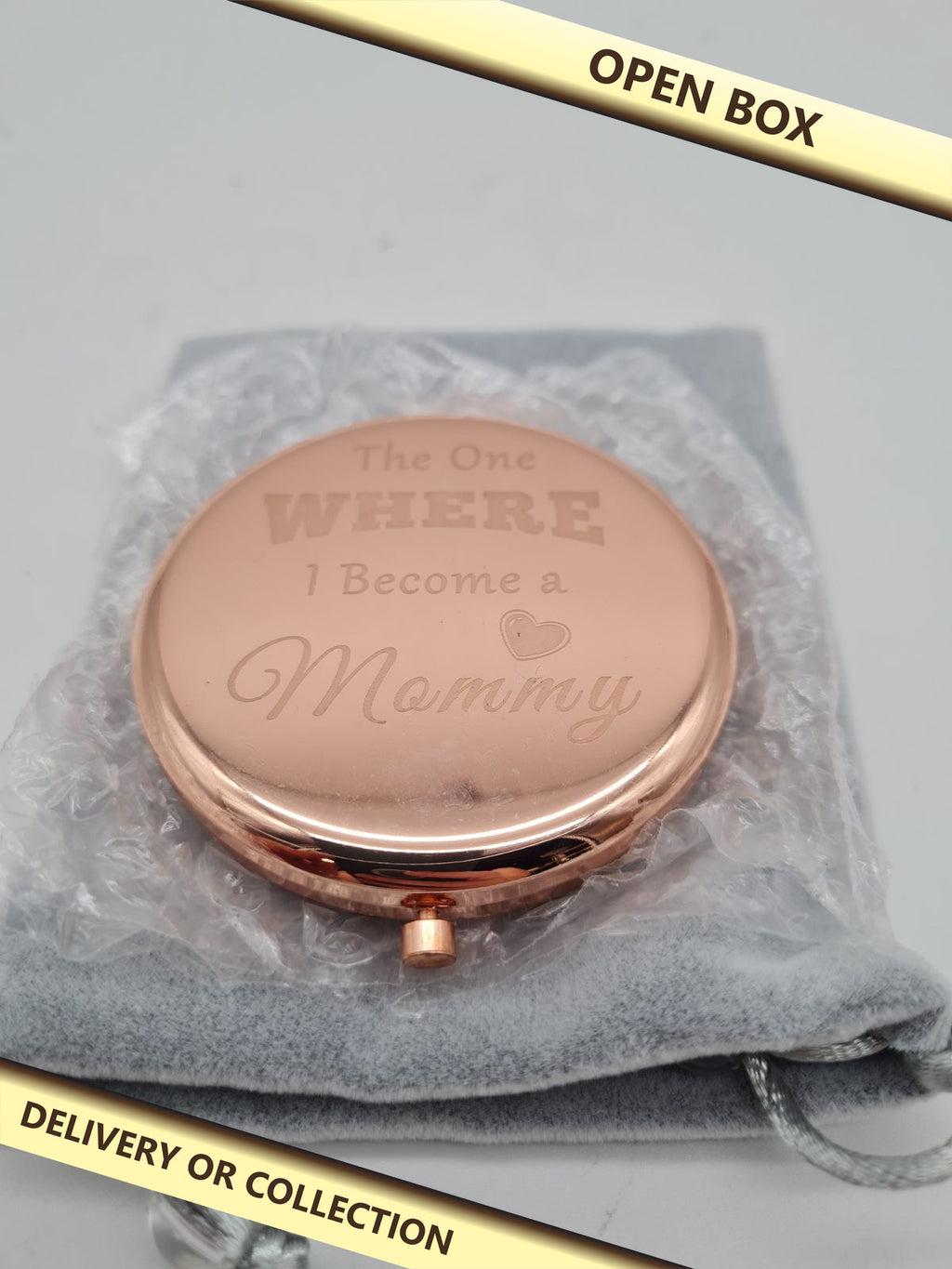 Engraved “Mommy” Compact Mirror — photograph 1 — Open box; auction delivery information shown on image