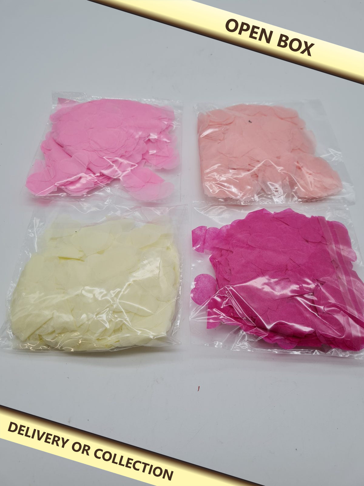 Heart-Shaped Paper Confetti – 4 Packs — photograph 1 — Open box; auction delivery information shown on image