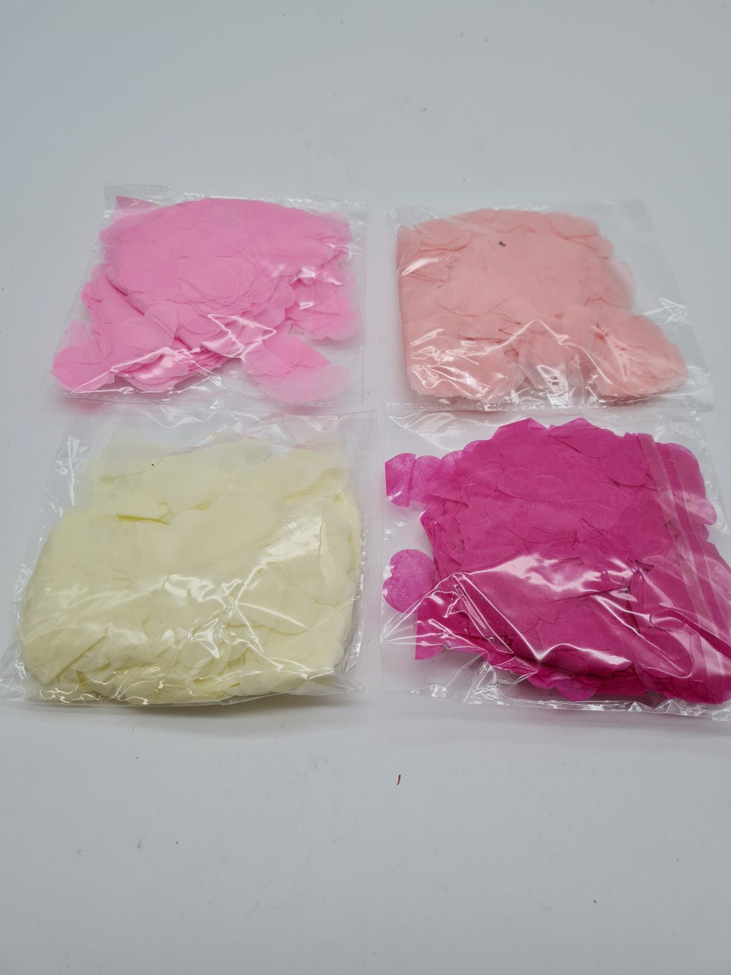 Heart-Shaped Paper Confetti – 4 Packs — photograph 1