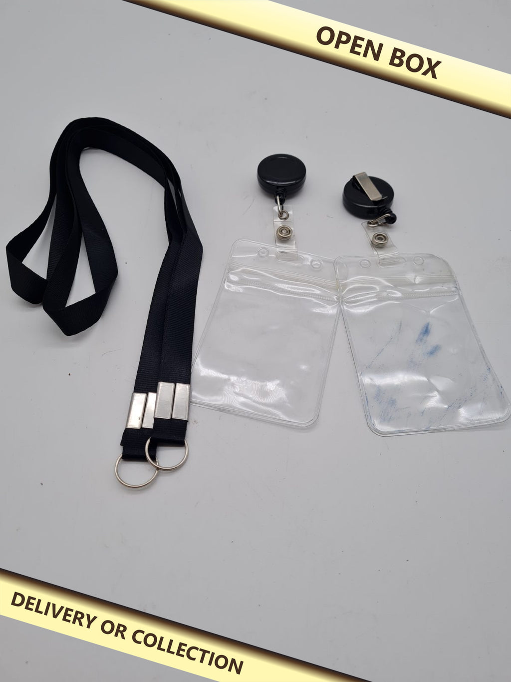 Lanyard and ID Badge Holder Set — photograph 1 — Open box; auction delivery information shown on image