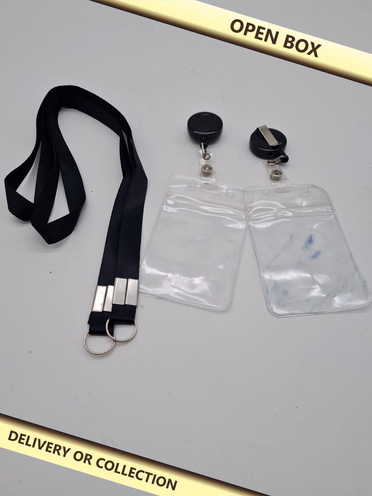 Lanyard and ID Badge Holder Set — photograph 1 — Open box; auction delivery information shown on image