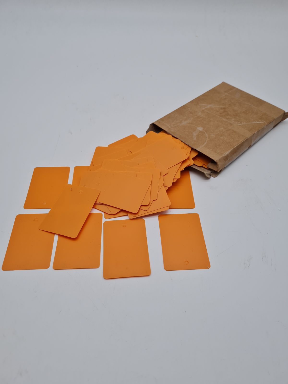 Plain rectangular plastic tags — photograph 1