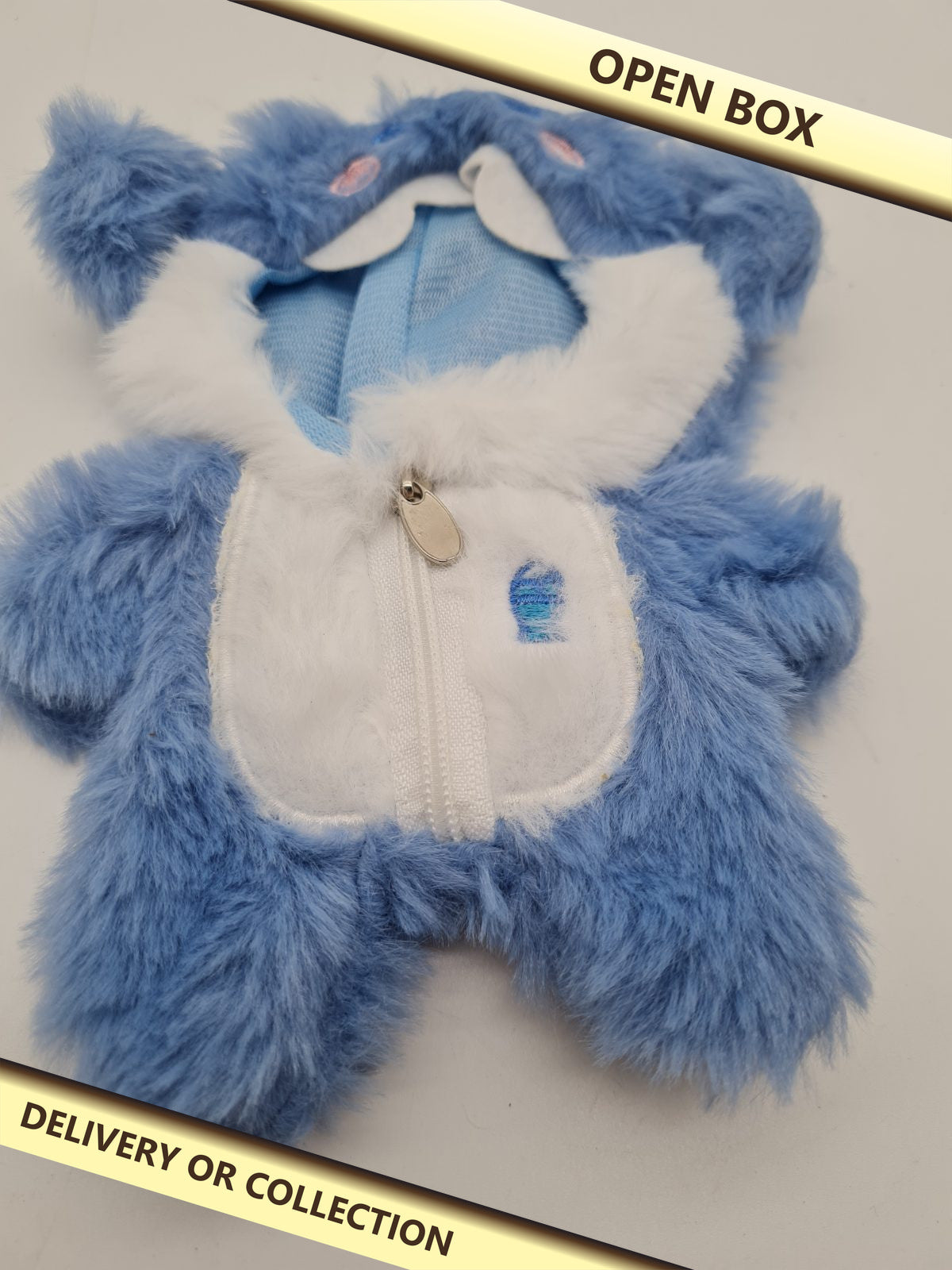Clothes for a 6.7 inch doll costume — photograph 1 — Open box; auction delivery information shown on image