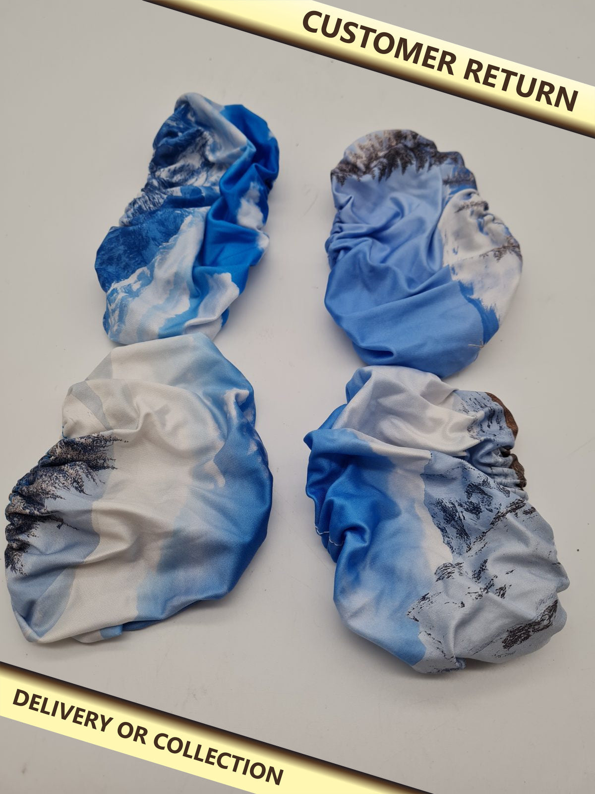 Set of Four Elasticated Fabric Covers — photograph 1 — Customer return; auction delivery information shown on image