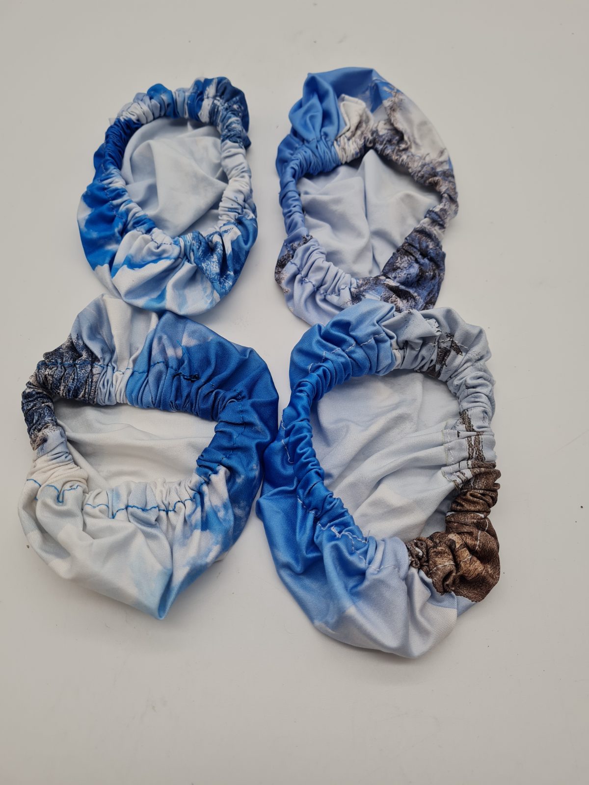 Set of Four Elasticated Fabric Covers — photograph 2