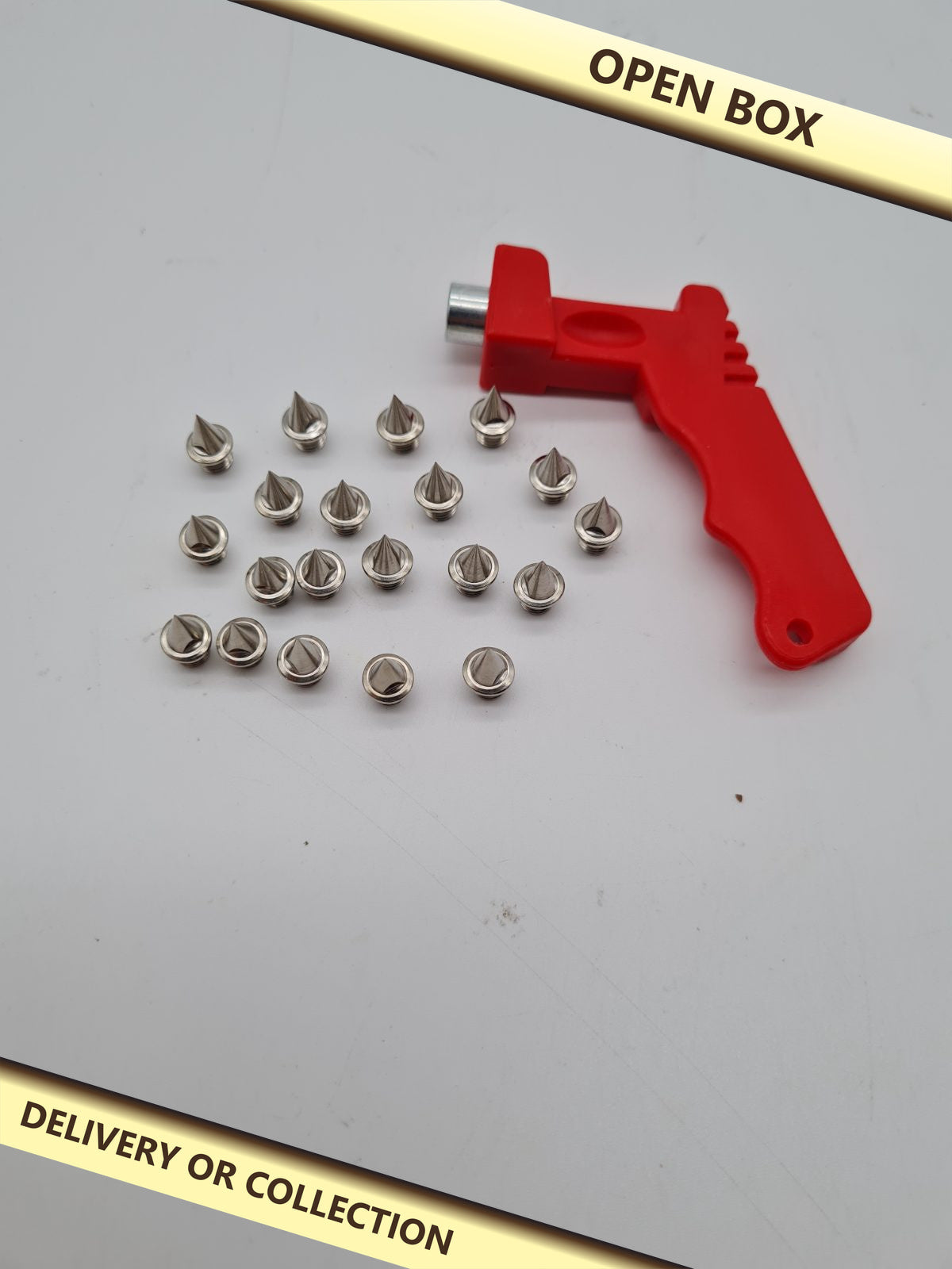20-Piece Running Shoe Track Spike Set with Fitting Wrench — photograph 1 — Open box; auction delivery information shown on image