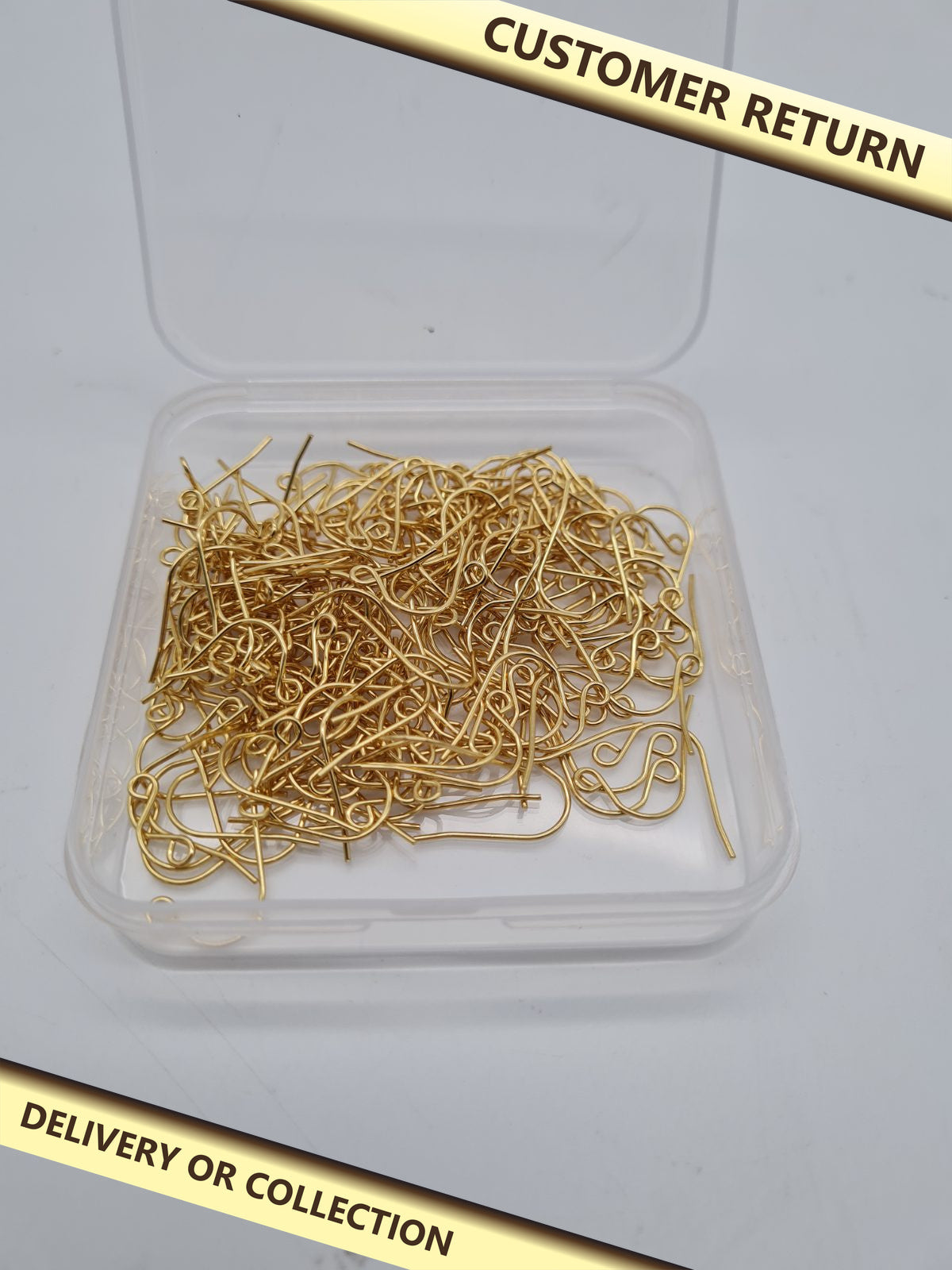 Lot of Fishhook Earring Findings — photograph 1 — Customer return; auction delivery information shown on image