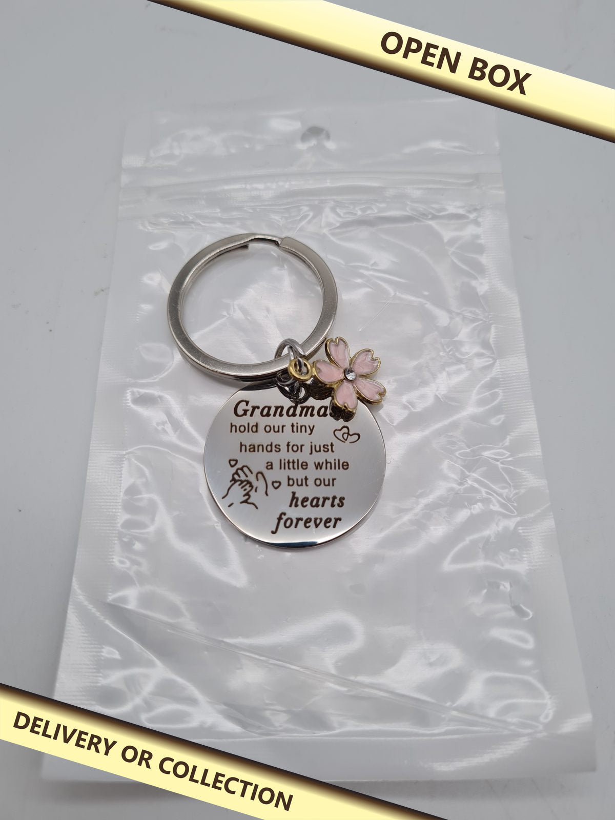 Grandma Sentiment Keyring with Flower Charm — photograph 1 — Open box; auction delivery information shown on image