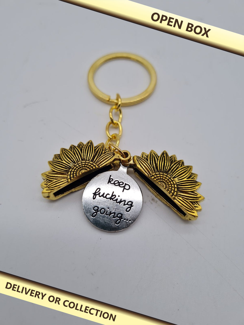 Sunflower Locket Keyring — photograph 1 — Open box; auction delivery information shown on image