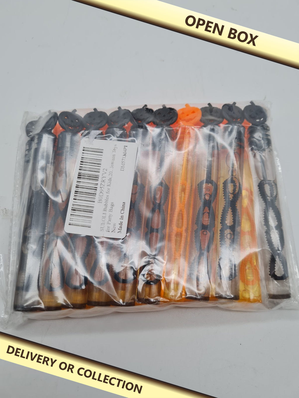 Halloween Bubble Wand Set — photograph 1 — Open box; auction delivery information shown on image